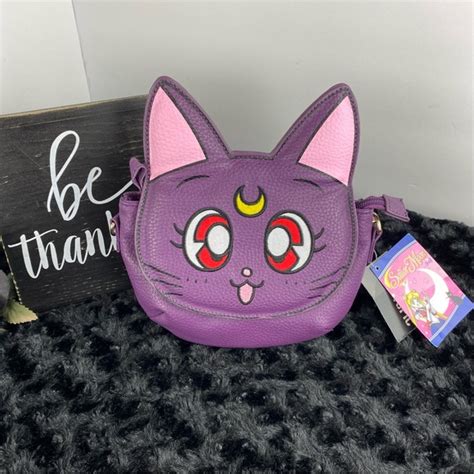 sailor moon luna purse|More.